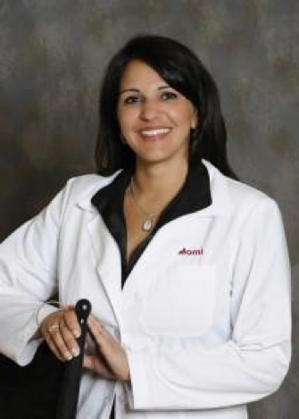 Dr. Anu Momi, owner of Anu Medical Spa, headshot